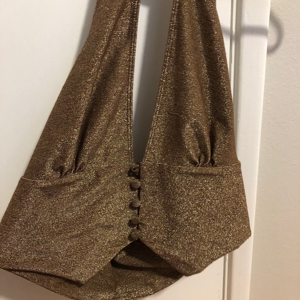 Metallic gold halter crop top.